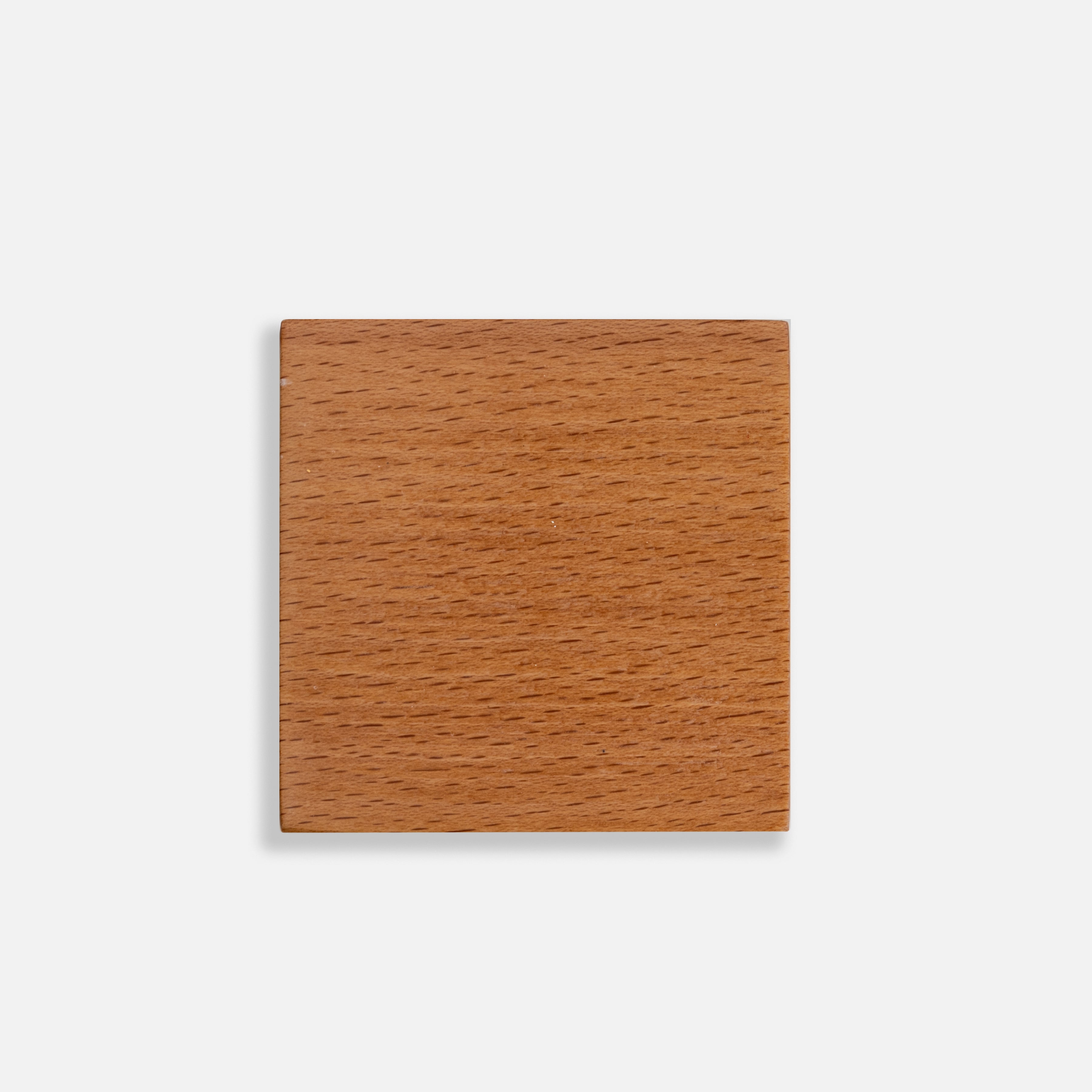 Square wooden block on a light gray background