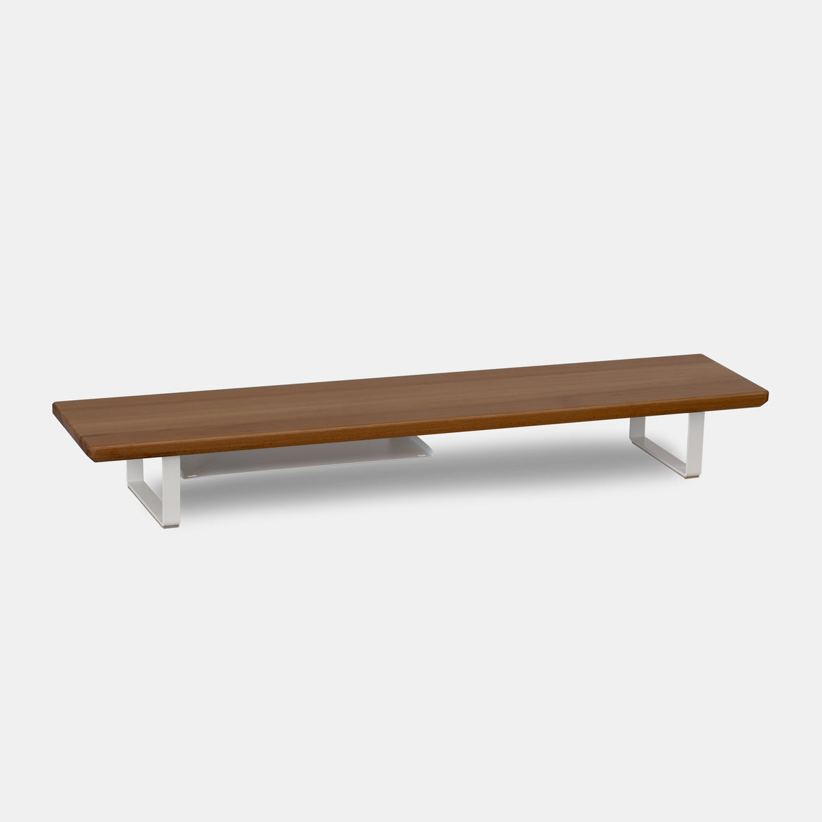 beech wood top with white legs monitor shelf on a light gray background
