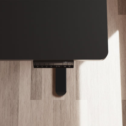 LiftSync Pro L standing desk in black with L-shape design