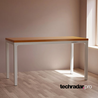 LiftSync Quad Pro standing desk featuring solid wood top with four motors and four legs