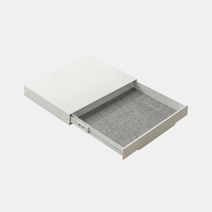 White drawer with gray felt lining on a white background